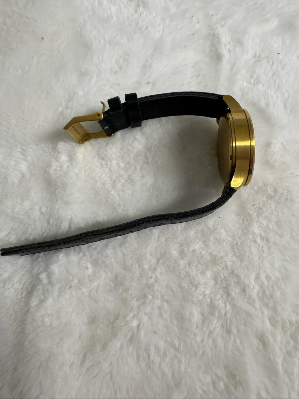 Nixon men’s gold